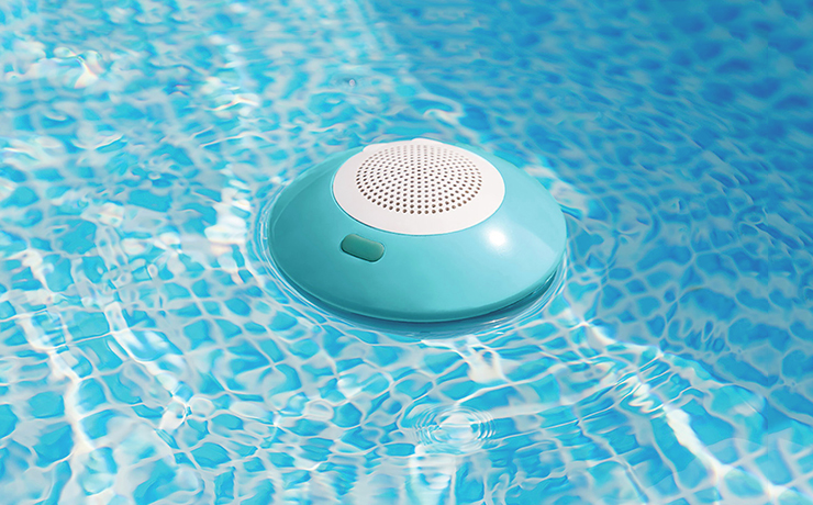 Image of a hot tub speaker floating in the water.