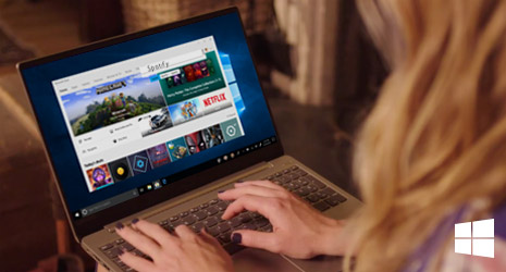Image of someone typing on a laptop.