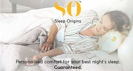Image of a woman asleep on a bed. Quote saying 'Personalised comfort for your best night's sleep. Guaranteed.'.
