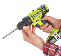 Image of a man demonstrating how to use a hammer drill.