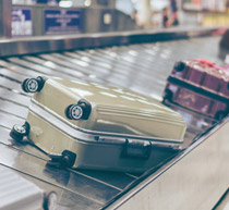 Image of a hold luggage case on a baggage carousel.