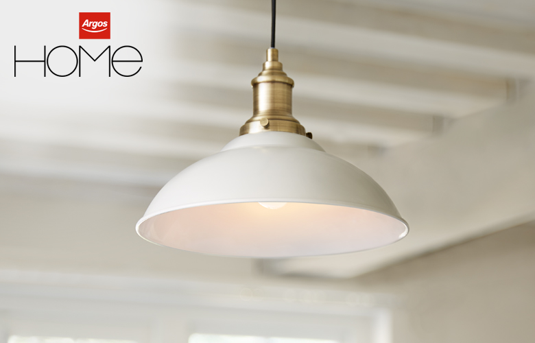 A cream coloured metal pendant light. This is one of our designer's product picks.