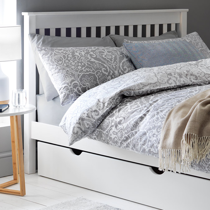 Bed Ideas Argos A White Wooden Bed Frame With Blue Patterened Bedding