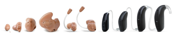 Assortment of hearing aids of various sizes and designs.