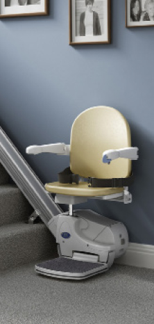 Age UK Stairlift with beige seat.