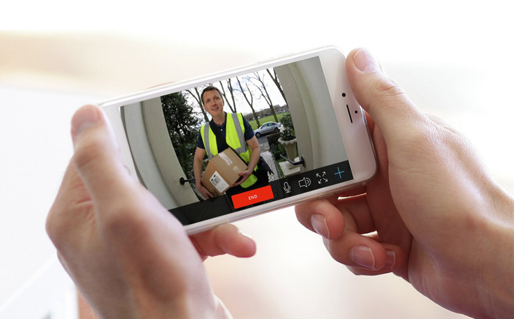 Using smart phone to talk to delivery man at door