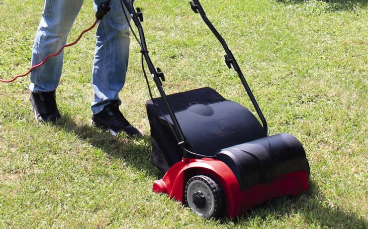 Person mowing lawn