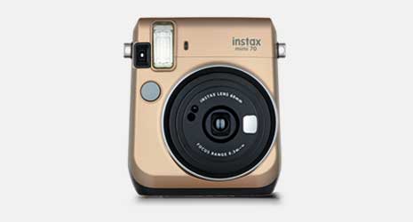 Cut-out image of an instax Mini 70 instant camera in red on a grey background.