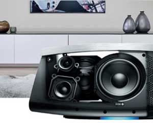 Image of a HEOS speaker in a room.