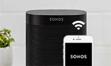 mage of a Sonos speaker with a mobile phone infront of it with the Sonos app open on the screen.