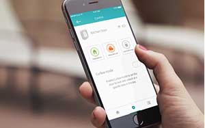 Image of a hand interacting with the Sure vPetcare app on a mobile phone.