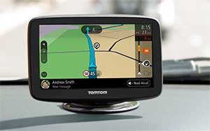 Image of a TomTom sat nav mounted on a dashboard.