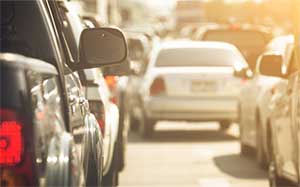 Image of lots of cars queing in a road.